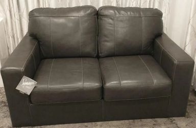 The Ashley Morelos Sofa is a contemporary sofa with a minimalist style-Perfect condition, Brand new with tags