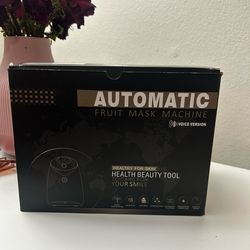 Automatic fruit mask machine