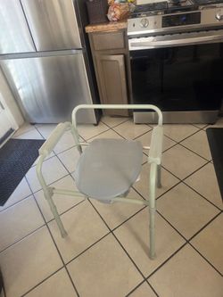 New Clothes rack and toilet chair.