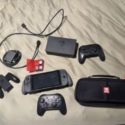 **NINTENDO SWITCH BUNDLE** SWITCH + SMASH BROS ULTIMATE + ZELDA BREATH OF THE WILD + LEGO  CITY+ CARRYING CASE + 2 PRO CONTROLLERS + CARTRIDGE CASE + 