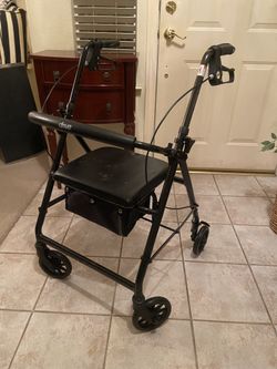 Rolling walker with brakes and seat