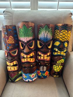 4 hanging Tiki mask decor all for 25.00