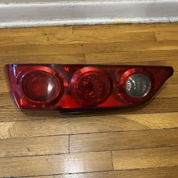 tail light for Acura RSX (2002–2004).