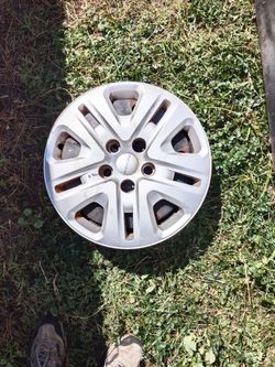 Four rims and hubcaps for Dodge caravan 17 inch