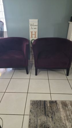 Purple plush sofa chairs