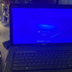 Windows 7 Lap Top With The Cooling System 