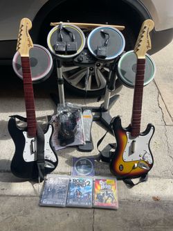 PlayStation  3 rockband set: 2 guitars, drums, mic, and games with extras
