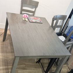 Gray Wood Grain Dining Table - need gone by May 2nd!