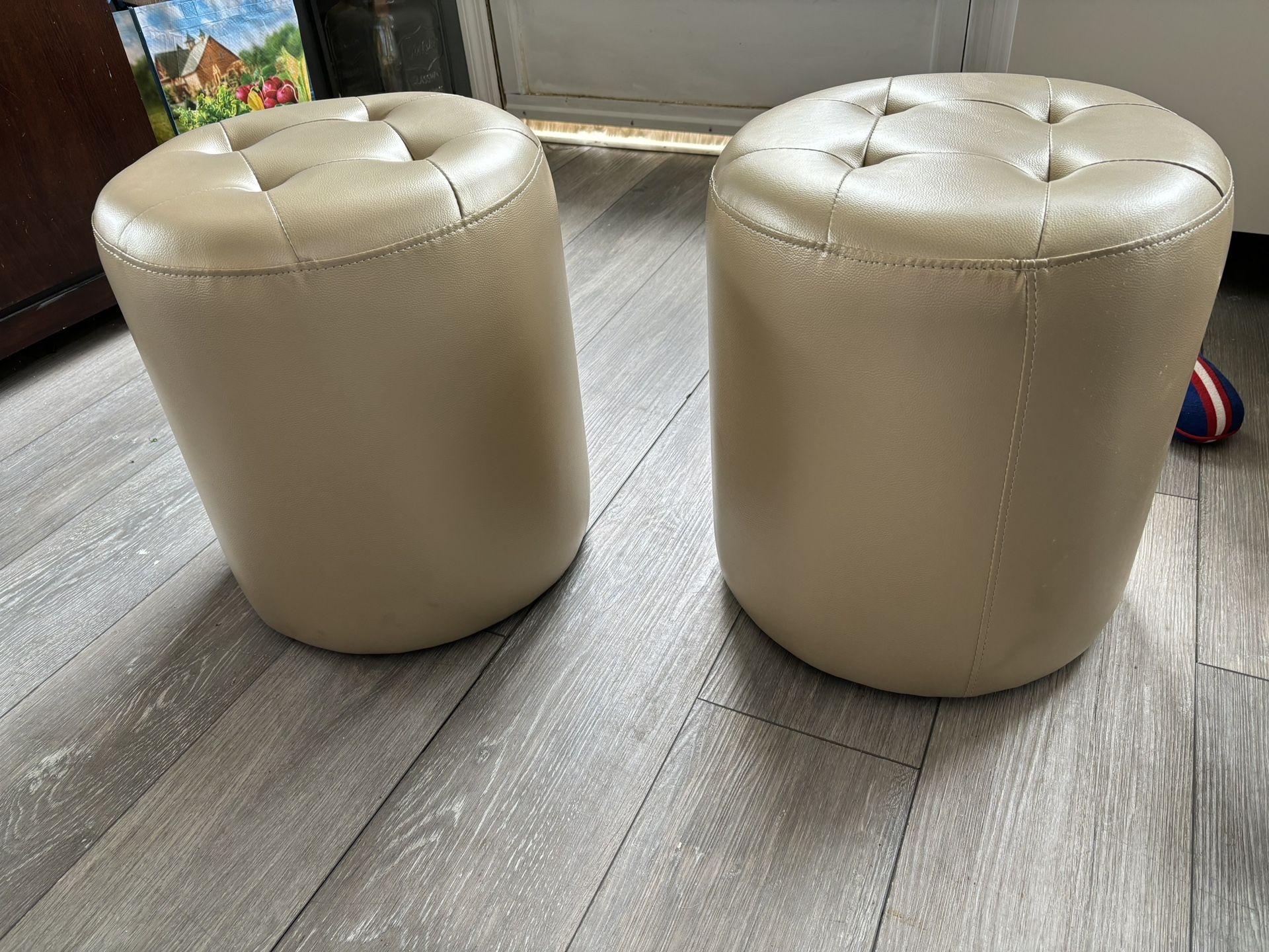 2 Gold Cylinder Ottomans