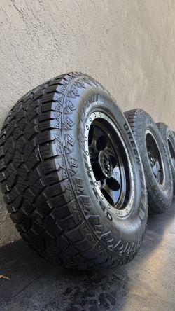 LT305/70R17 Mickey Thompson Classic Baja Tire And Rim Lock Black Wheels with Green MAX OPTIMUM Sport