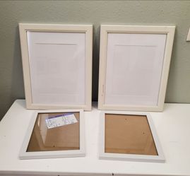 4 white picture frames