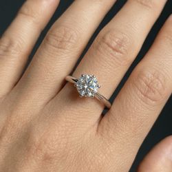 1 CT Moissanite stud ring set in  .925 sterling silver