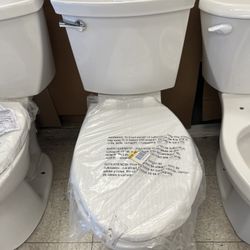 American Standard Champion Two-Piece 1.28 GPF Single Flush Elongated Chair Height Toilet with Slow-Close Seat in White