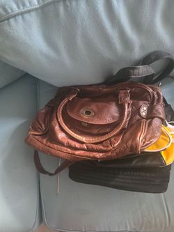 A collection of womans purses