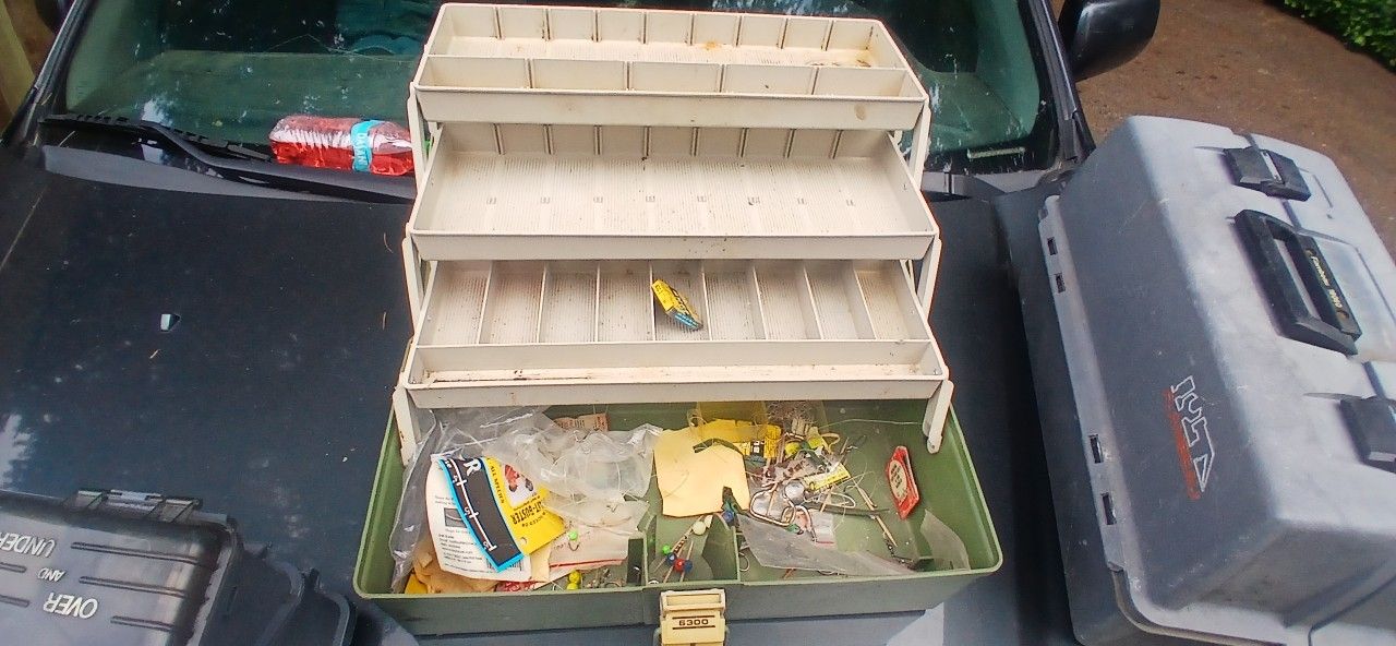2 tackle boxes with tackle