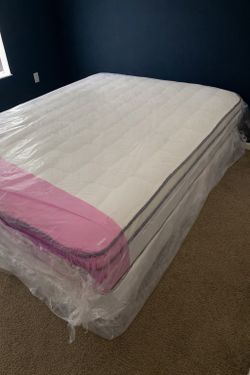 New queen mattress and box spring 2 pc bed frame is not included