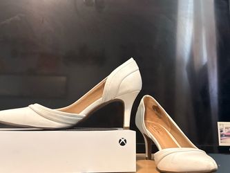 White kitten heels