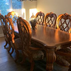 China Cabinet, Wooden Dinner Table With 8 Dinner Chairs The Table Has Scratches 