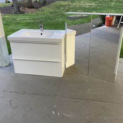 White Wall sink and mirror vanity pair