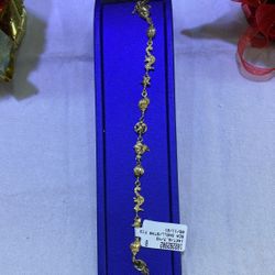 14 KT Gold Bracelet W/Sea Shells and Stars