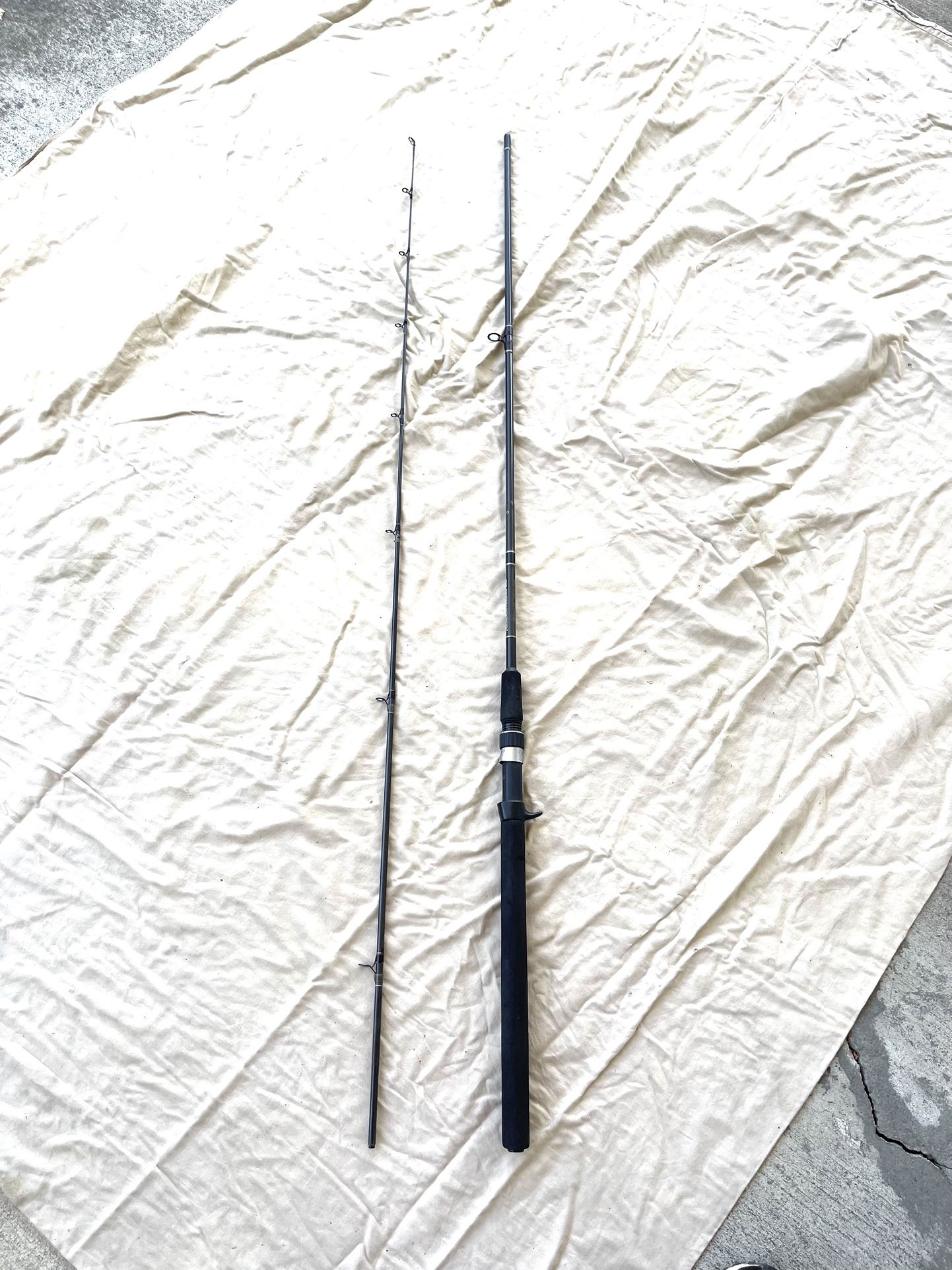 New Only Used Once Daiwa (Eliminator) Graphite 8.6ft two piece, medium action, fishing rod