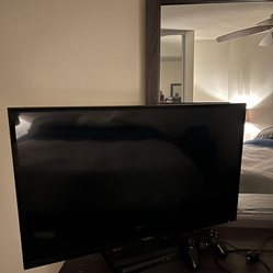 TV with Video Game Remote