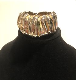 Vintage soft sculpted gold tone clamper bracelet