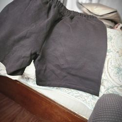 Essentrial fear of God black shorts sz. Lg white logos