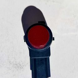 Tesla parking sensor red