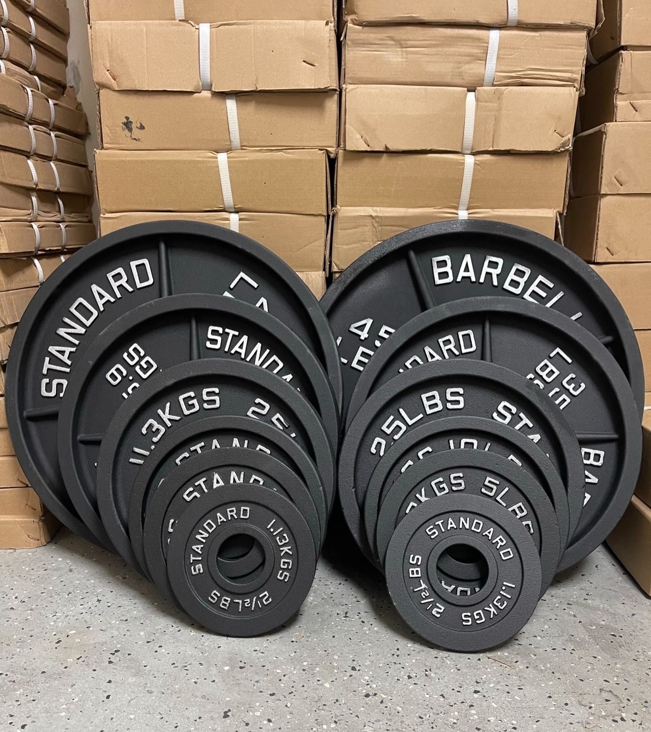 Cast Iron Olympic weights 245 Lb Set Brand New Still In The Box