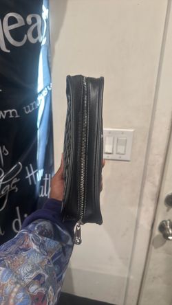 black toiletry goyard bag