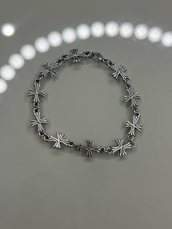 chrome cross bracelet