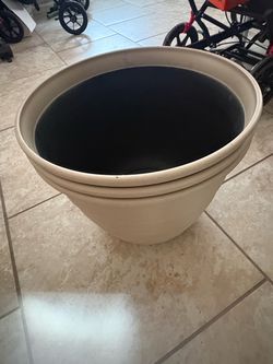 NEW plastic planters  12” tall 14” diameter new