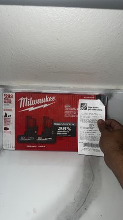 Milwaukee Two M12 Batteries With Charger 