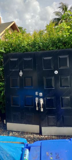 Exterior metal double doors all metal top bottom size corner approximately 36x36x78.5