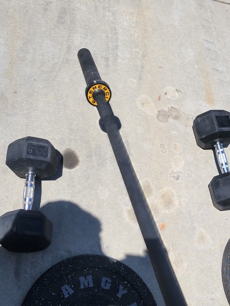 Very Nice And Strong 7 Ft Olympic Barbell That Holds Up To 1500 Lbs And 5 Ft Olympic Bar