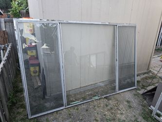 Two aluminum windows  96"W x60"H