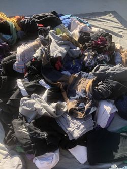 All this clothes fits in 3 large 13” tall bags.