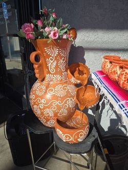 15%0ff Fuente florero ($165)tel (contact info removed)