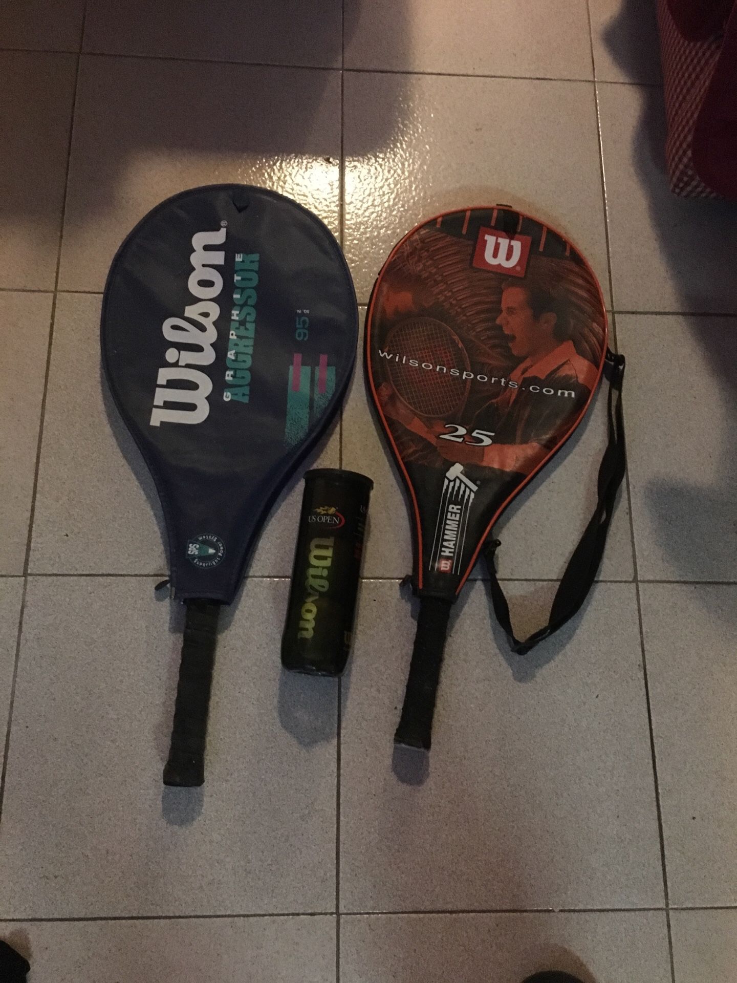 2 Wilson tennis rackets with balls