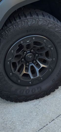 4 Ram Trx factory beadlock rims and tires.