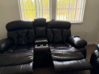2 leather Recliner sofas