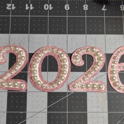Pearlized Topper Numbers 2026 