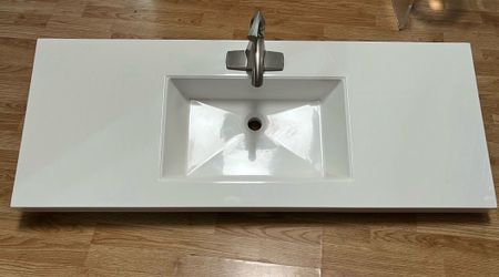 White Vanity Countertop with Integrated Sink and Faucet