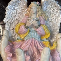 Ceramic Angel W/dove In Gods Hand 