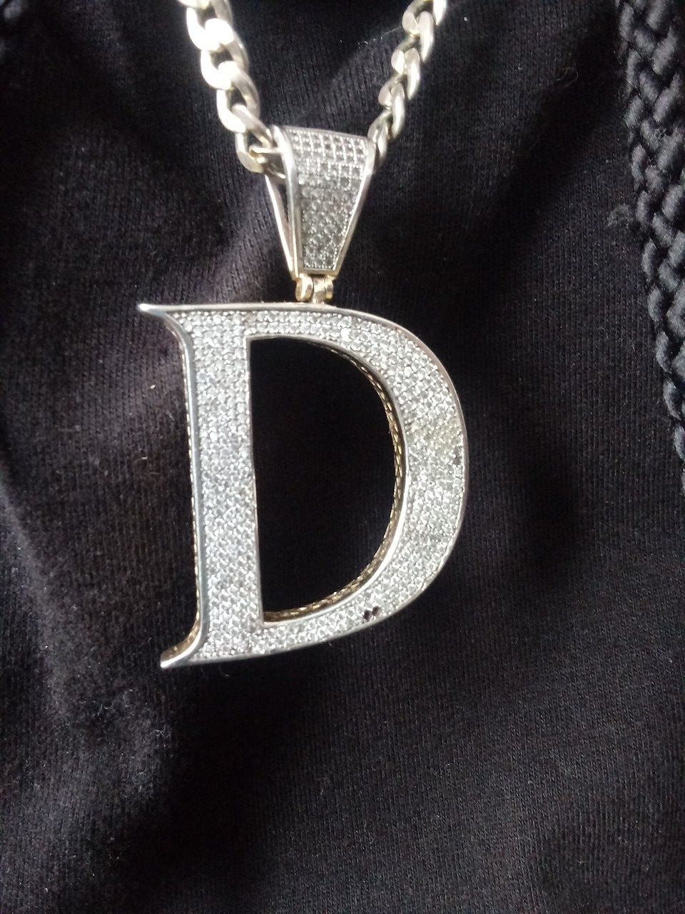 Iced out letter D charm