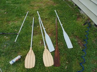 All sorts of paddles, oars, nets , life jackets