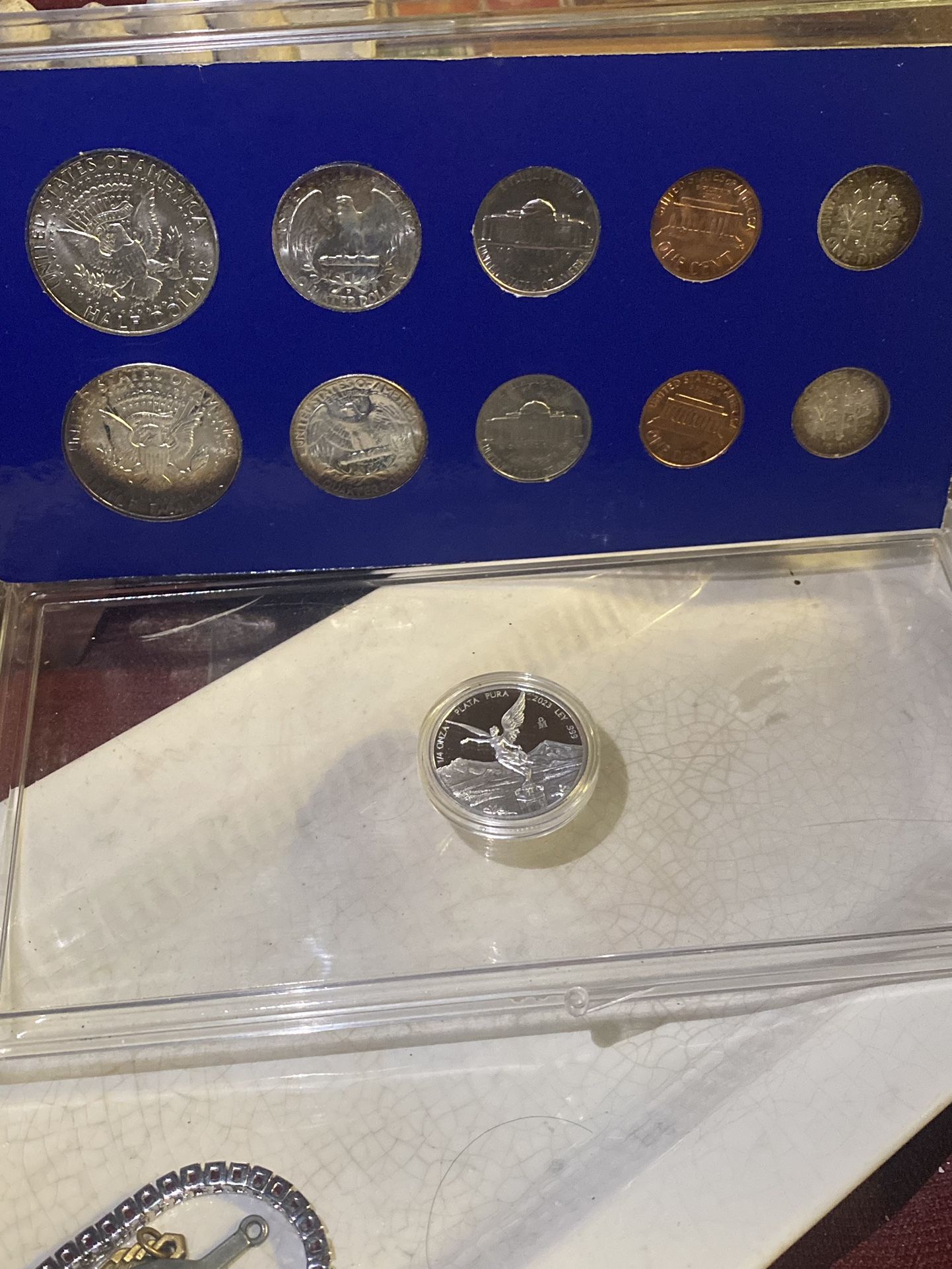 Coin I have a Philadelphia and Denver proof set with very nice toningd a quarter