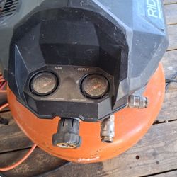 RIDGID 6 Gal. 150 PSI Portable Electric Pancake Air Compressor.