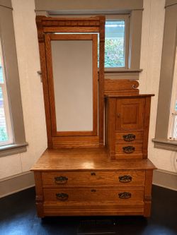 Bi-level dresser with mirror